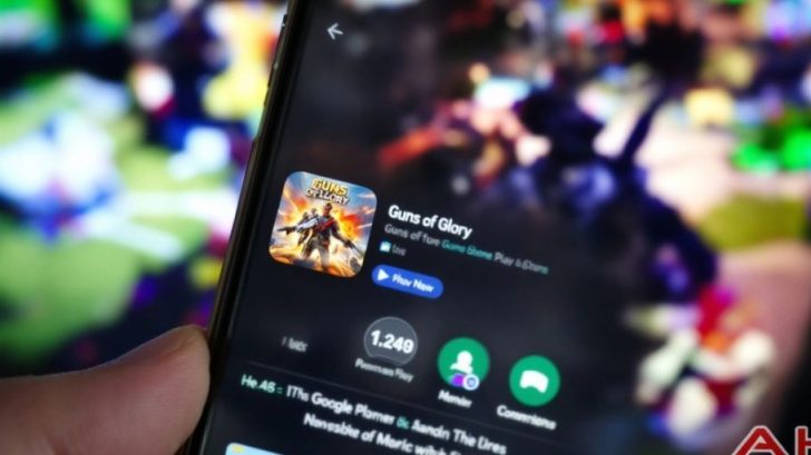 Smartphone showing Google Play Store with Guns of Glory.